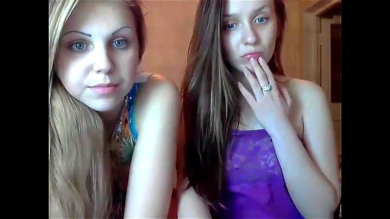 Two girls have fun in front of the camera Two girls have fun in front of the camera