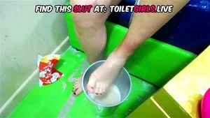 BATHING HER FACE AND FEET IN HER MESS :)