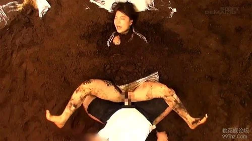 Japanese Woman Fucked while buried in dirt
