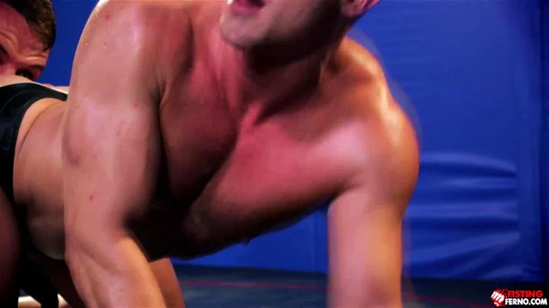 Hung jock Shane Cook begins his near naked wrestling match