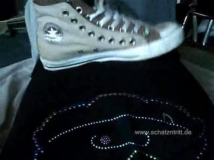 Girl step _ trample on a guy with chucks