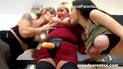 Two Horny Grannies Fuck Teen With a Strapon