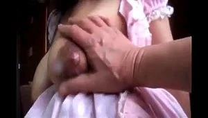 Lactating Asian with huge tits