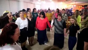 Eastern Eur Mid-Aged Bouncers in Red Shirt at Wedding