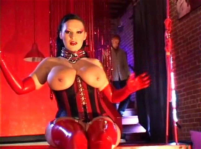 Busty Latex Queen in Corset