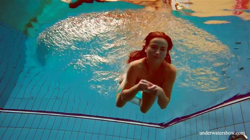 Big tits petite babe Deniska swimming in the pool Big tits petite babe Deniska swimming in the pool