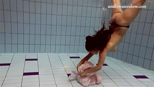 Paulinka underwater stripping babe