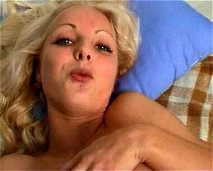 Cute blonde chick strips and masturbates