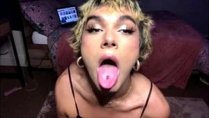 Short haired blond shemale stroking her shaft and pleasures her ass