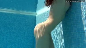 Sexy Nicole Pearl with small tits in the pool