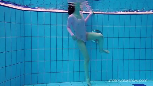 underwater teen, public, water, brunette