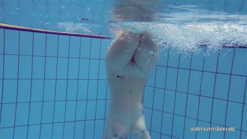 Redhead in the pool