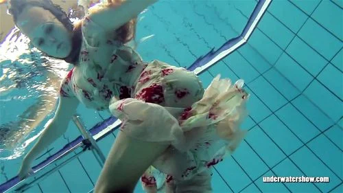 Beautifully dressed underwater babe Lucy Gurchenko