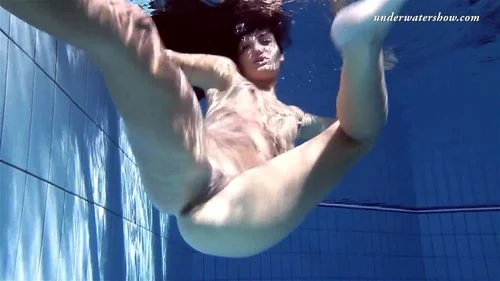 Gypsy black haired babe swimming underwater