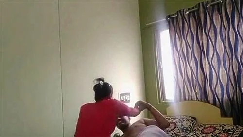Indian wife getting ready for her husband
