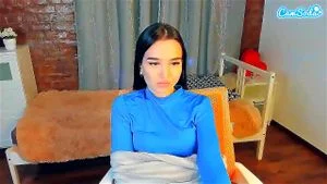 relaxed Asian camgirl blue half top