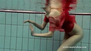Katya Okuneva strips in her red lingerie underwater