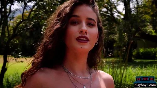 Gorgeous all natural model babe Megan Blake outdoor striptease for Playboy