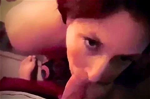 Redhead milf with her tits out sucks dick and takes a easy facial cumshot