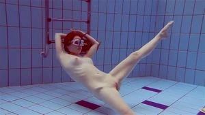 Hot naked girls underwater in the pool