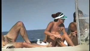 Brunette Milf with Big Tits at the Beach