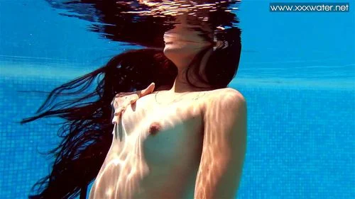 Small tits Latina babe Andreina Deluxe underwater