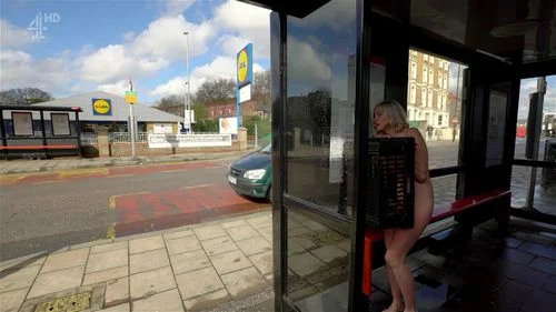 naked in public, embarrassed nude female, blonde, embarrassed