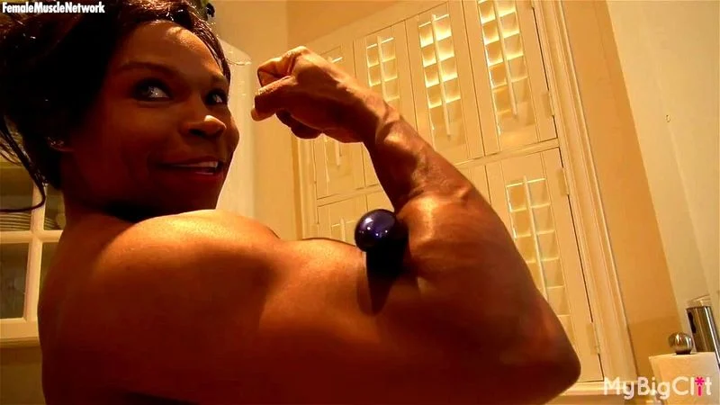 Ebony Female Bodybuilder Flexing and Toying3