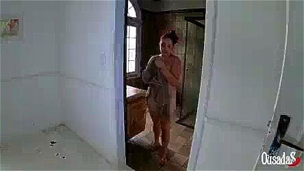 actress gets into the shower for a bath