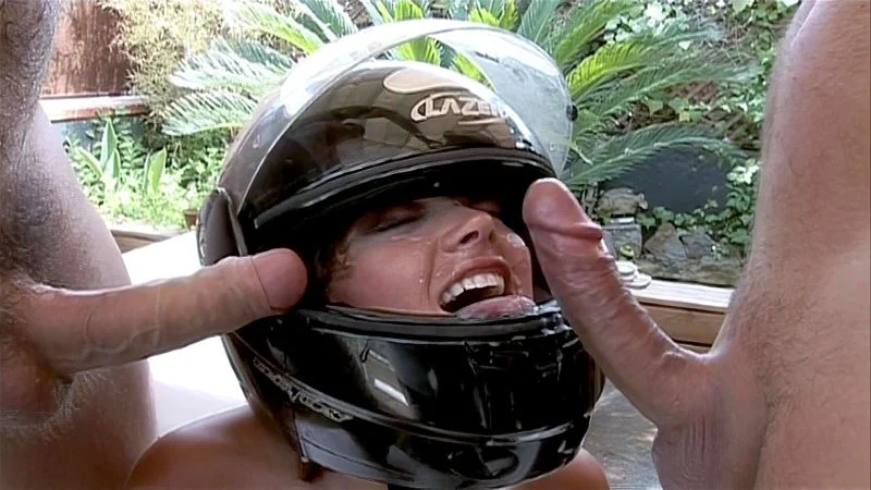 Curly redhead is DP'd outdoors and wears a bike helmet for the cum shots