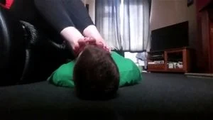 Human footstool thumbnail