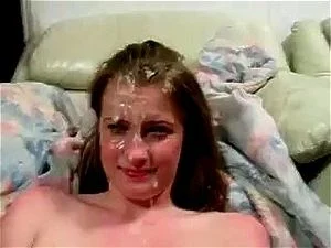 Shy whore has face covered in cum