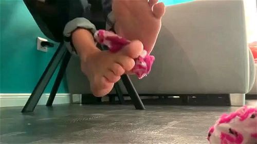 Pink ankle socks tease under table