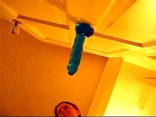 Amateur squirts with jelly dildo on door
