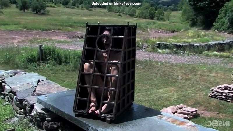 Girl locked in cage outside