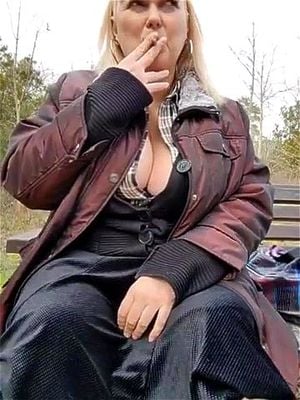 milf smoking and playing outdoor