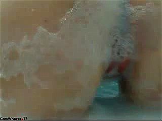 Camgirl plays in bathtub