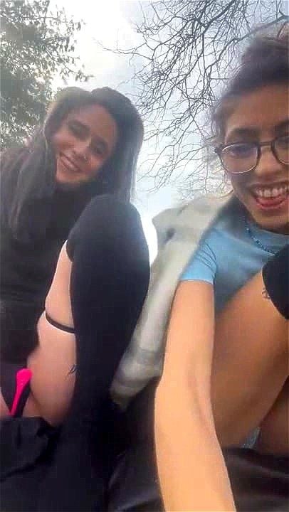 Two cute stocking lesbian teen babes outdoor teasing