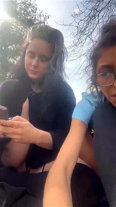 Two cute stocking lesbian teen babes outdoor teasing
