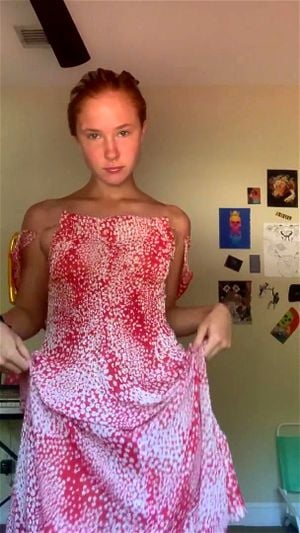 Sexy redhead dances sensually and seduces you with her small tits and big ass.