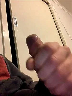 Masturbating