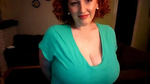 Beauty redheaded milf with big milky tits 4