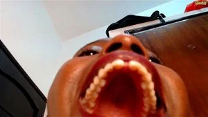Sexy african webcam babe's mouth 2