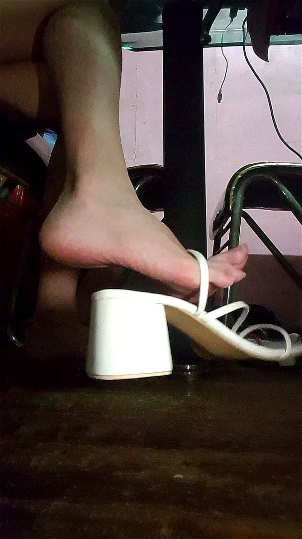 Clementine flowers plays with her sandals in front of your dirty face