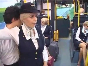 Busty stewardess public handjob in the bus