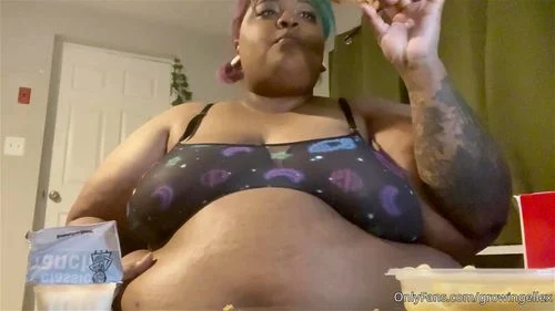 SSBBW stuffing her huge belly