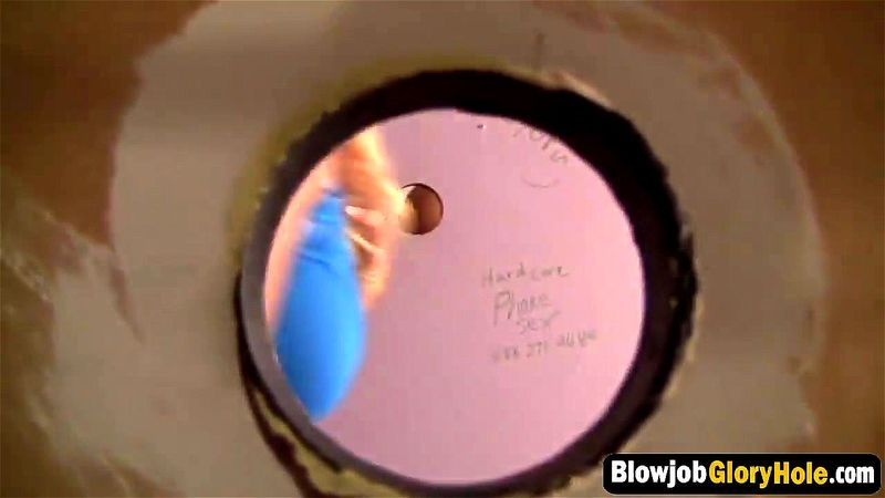 Cute blonde haired girl sucks a big glory hole cock