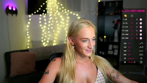Blonde pretty face tattooed babe solo tease on cam