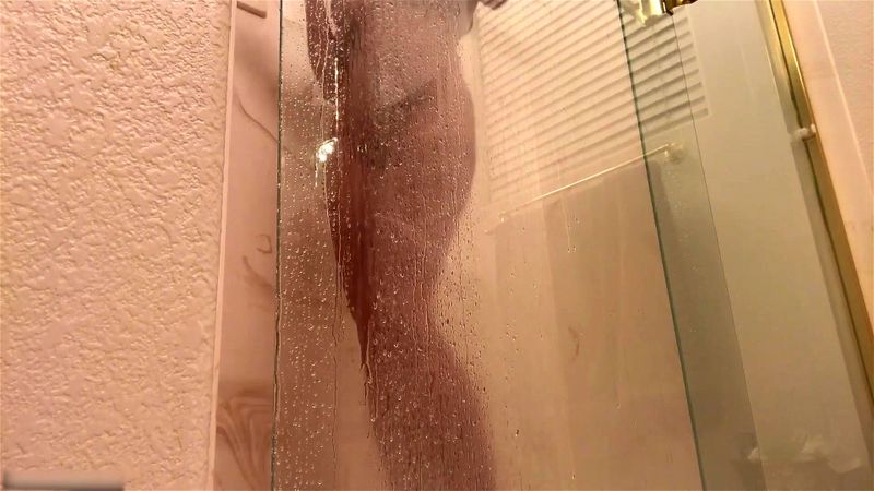 Beautiful women filiming herself while showering and bathing
