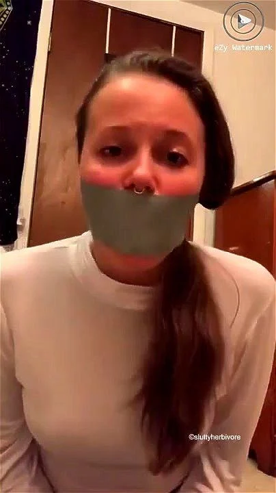 Woman self tape gagged talking
